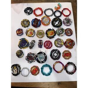 Beyblade Burst 34-Piece Lot – Hasbro GT / SpeedStorm – Metal Layers & Rings